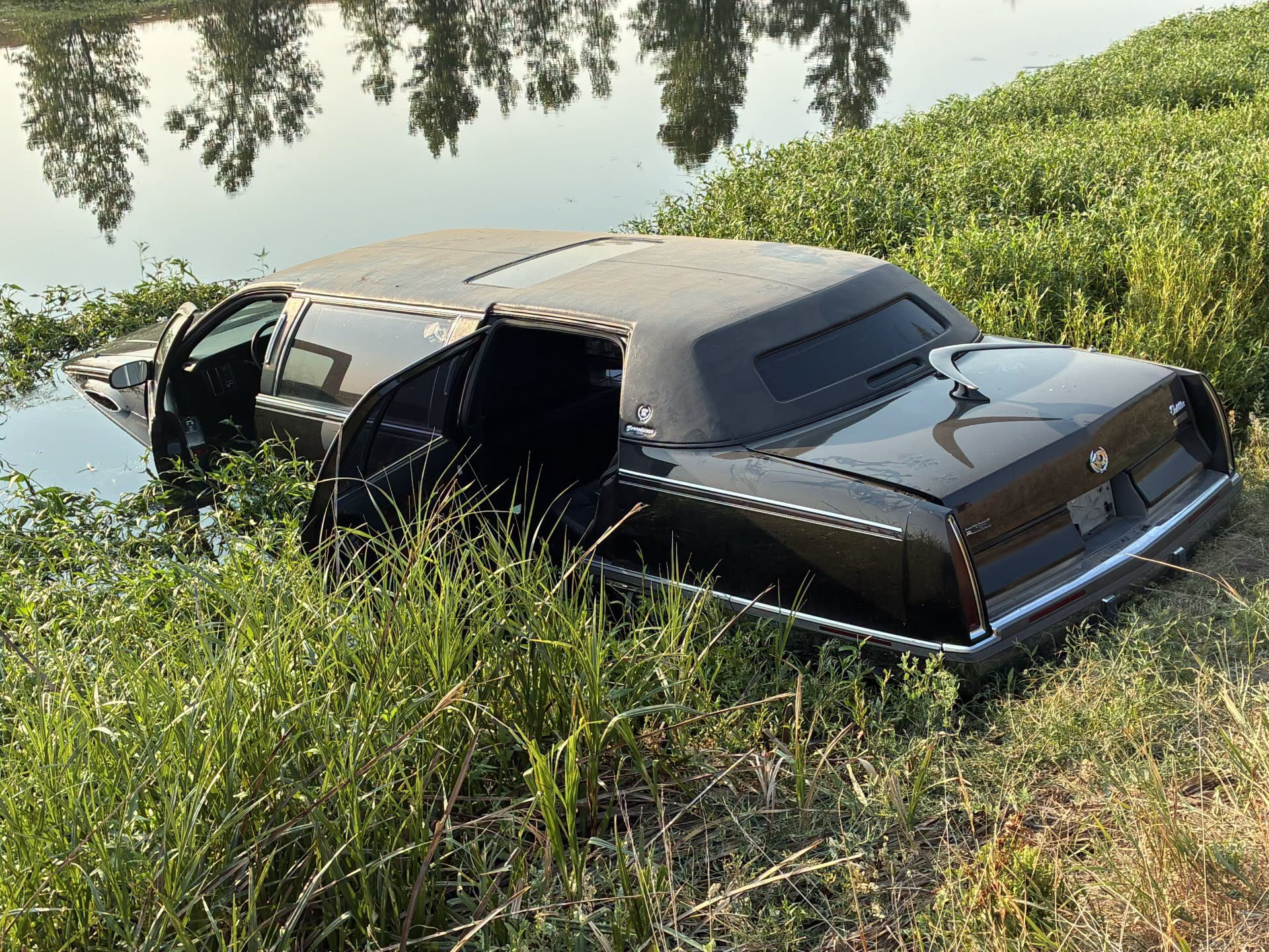 Vintage limousine pulled from sewer lagoon