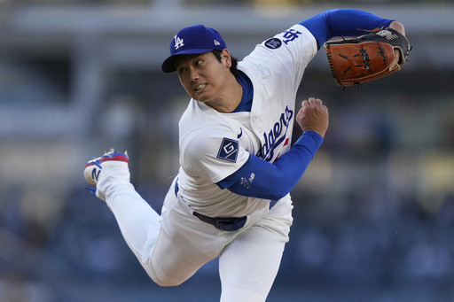 Shohei Ohtani gets first victory with Dodgers, striking out season-high 9 against Reds