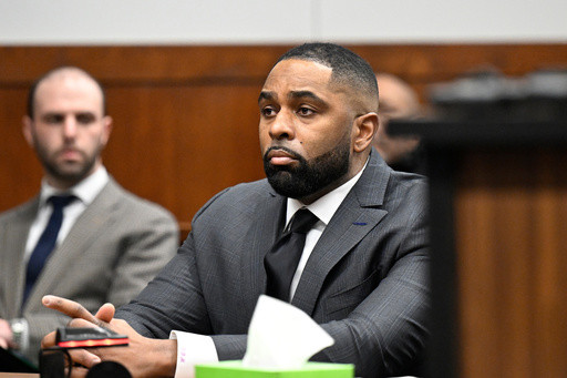 Judge grants hearing, expresses concerns ex-Michigan coach Moore may have had due process violated