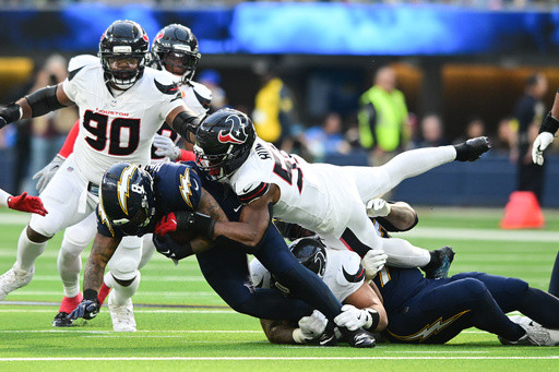 Texans’ defense swarms Chargers after offense’s fast start in playoff-clinching victory