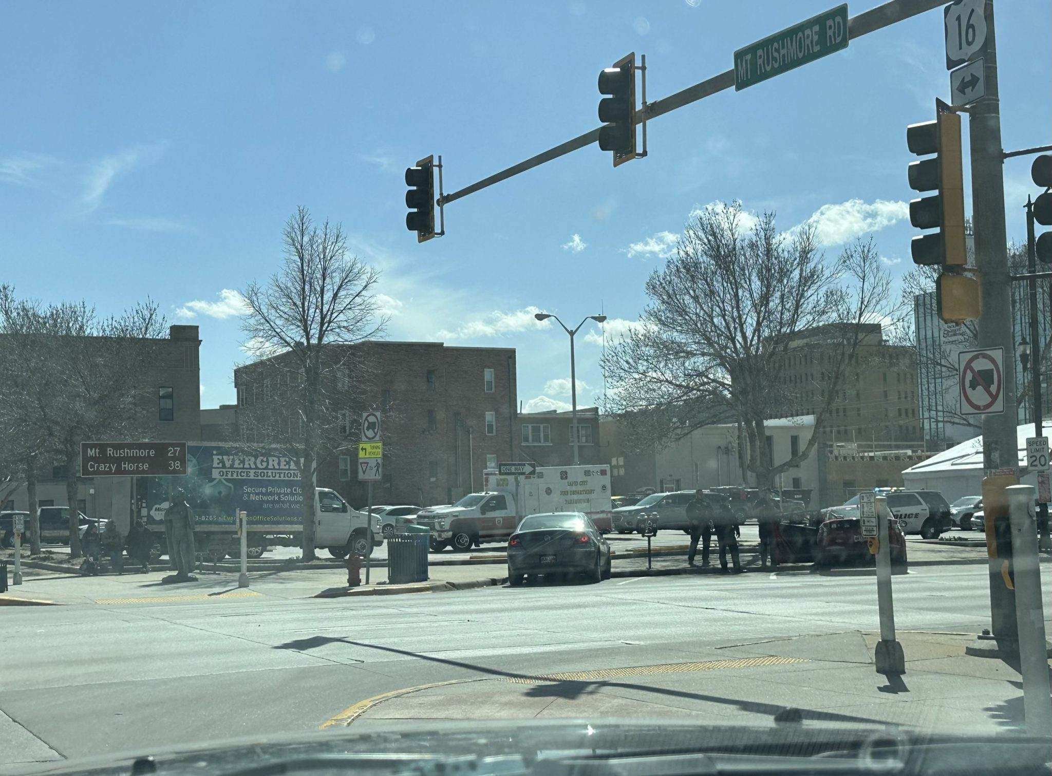 (UPDATE) Ambulance Leaves Scene, Police Investigate Red Sedan in Downtown Rapid City