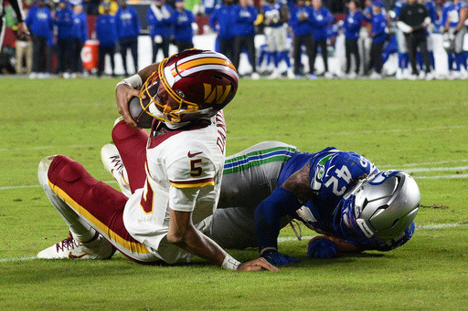 Jayden Daniels leaves game after Washington QB’s non-throwing arm bends gruesomely