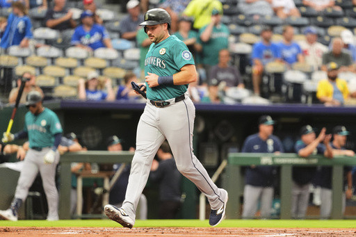 Cal Raleigh breaks Mickey Mantle’s switch-hitter homer record with No. 55 in series opener in KC