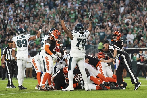 Push on! Eagles use tush push on opening drive after short-yardage play nearly banned in NFL