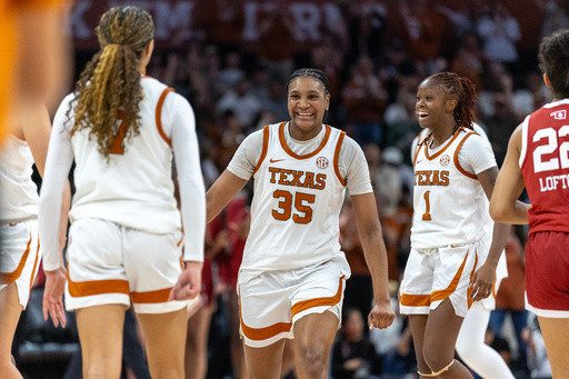 Booker, Carlton score 16 each as No. 4 Texas beats No. 10 Oklahoma 78-70
