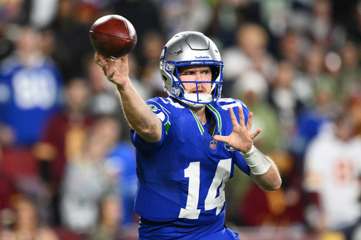 Sam Darnold leads Seahawks to easy 38-14 win over Commanders, who lose Jayden Daniels to arm injury