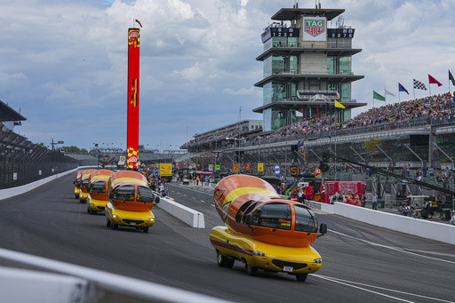 Hot diggity dog! Wienermobiles put on riveting race in Wienie 500 at Indianapolis Motor Speedway