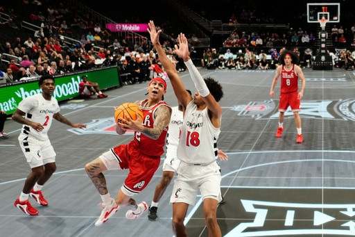 Cool as ice and maybe as slick: The Big 12’s new glass floor gets mixed reviews at league tourney