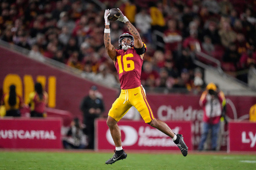 No. 20 USC pulls off fake punt after the Trojans’ 3rd-string QB switches to punter’s uniform number