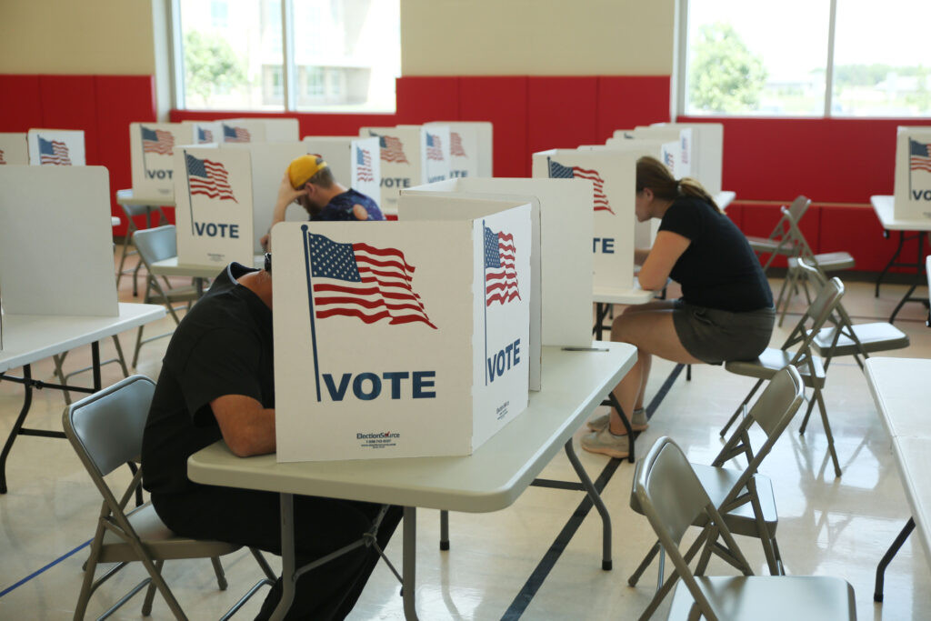 Temporary party switchers receive encouragement and criticism ahead of Republican runoff election