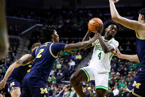 Elliot Cadeau scores 17 points to lead No. 4 Michigan over Oregon 81-71
