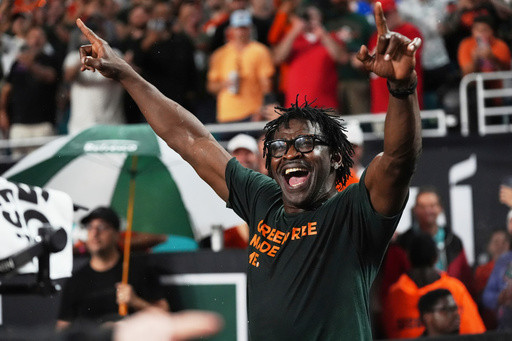 Why is Michael Irvin the most famous cheerleader in college football? Miami can’t get enough of him