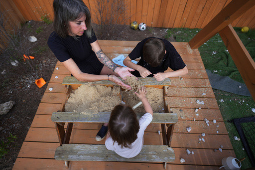 AP PHOTOS: A mother’s journey with autism: Eileen Lamb’s life with her 3 children
