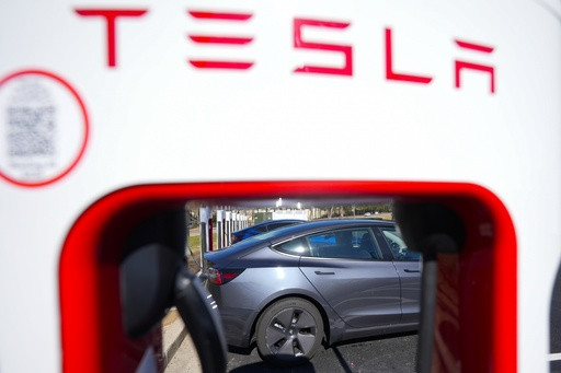 Tesla’s profit plunges again as the fallout from Musk’s politics continues to repel buyers