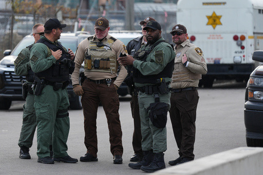 Court blocks the release of hundreds of immigrants arrested in a Chicago-area crackdown