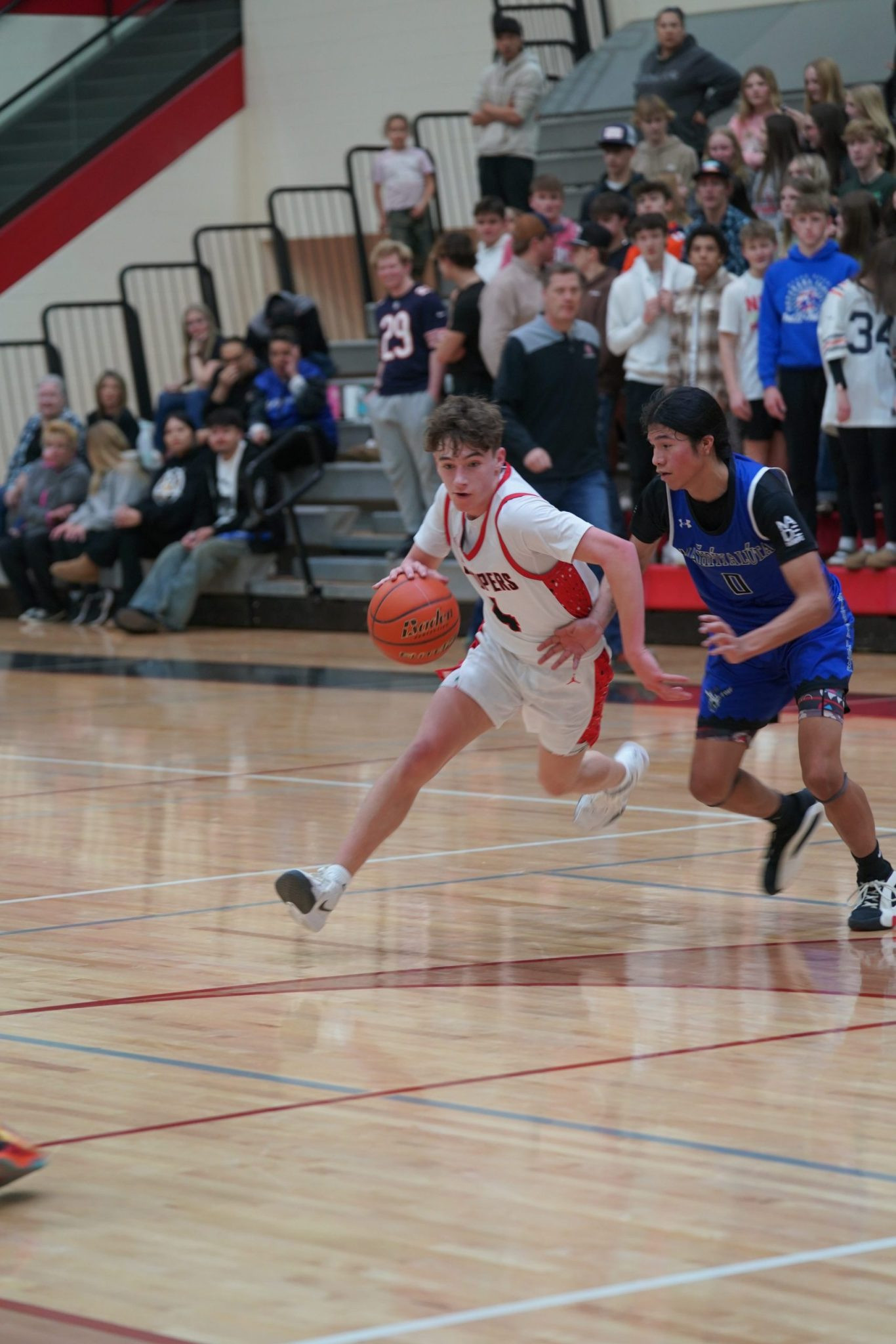 Scooper Basketball Teams Battle Crusaders