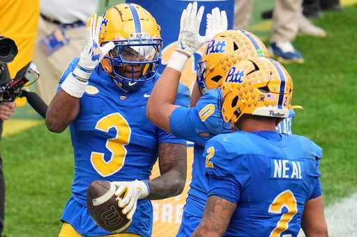 Pitt holds off No. 15 Georgia Tech 42-28 to stay alive in ACC race