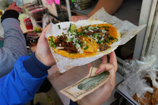 ‘A day without fear’: Chicagoans buy out street vendors amid immigration crackdown