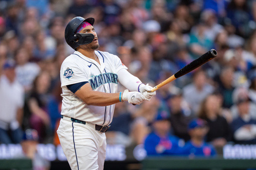 Mariners slugger Josh Naylor leaves game with back spasms after hitting home run against Mets