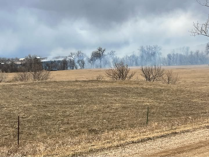 Crews battle grass fire east of Sturgis