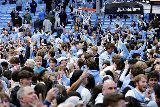 Duke’s Scheyer says staff members ‘got punched in the face’ during court-storming; UNC AD apologizes