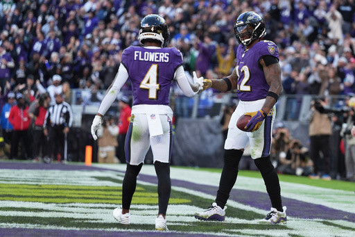 Henry rushes for 2 TDs to help sluggish Ravens to fifth straight win, 23-10 over Jets