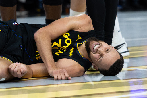 Warriors star Stephen Curry will be sidelined at least a week with a quad injury