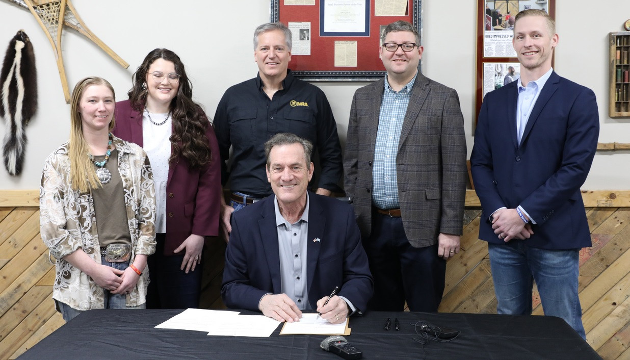 Governor Rhoden visits Mitchell; signs three gun-related bills