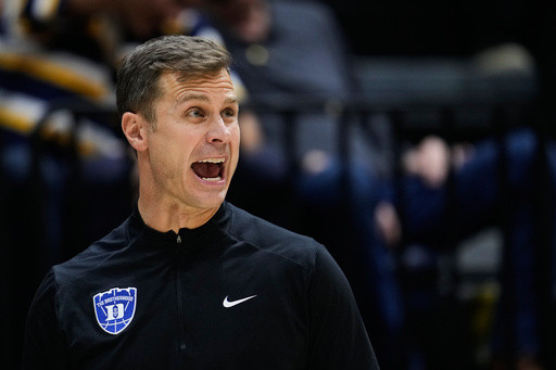 Duke makes its case as top seed by knocking off top-ranked Michigan in March Madness preview