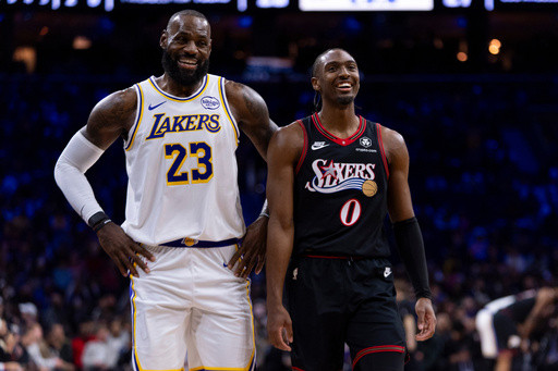 James hits go-ahead 3 and scores 29 points, Doncic has triple-double in Lakers’ win over 76ers
