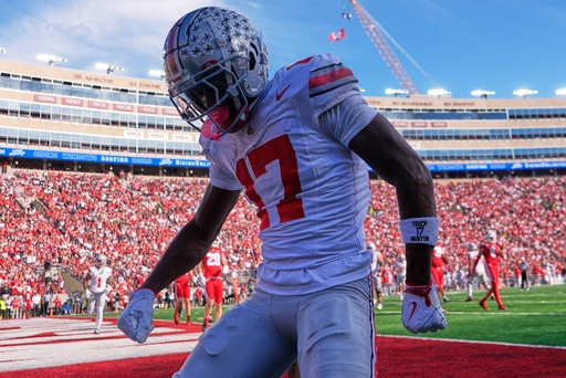 Sayin throws 4 TD passes as No. 1 Ohio State throttles Wisconsin 34-0