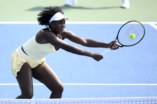 Venus Williams wins a doubles match at Washington in her first tournament in more than a year
