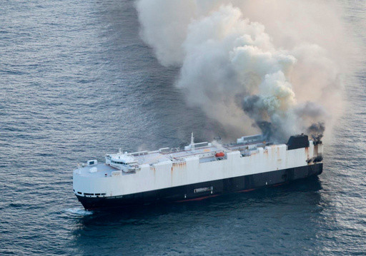 22 crew members rescued from lifeboat in North Pacific after ship carrying 3,000 cars catches fire