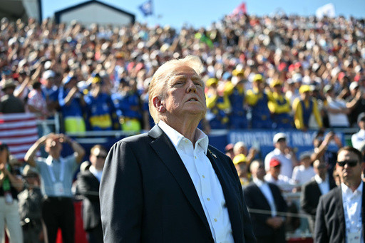 Trump swings by the Ryder Cup, soaking up fans’ love after vowing revenge on more of his enemies