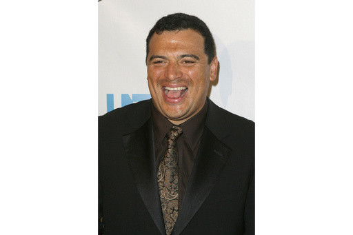 Comedian Carlos Mencia pleads not guilty to 12 felony charges of failure to pay taxes