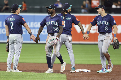 Mariners catch Astros in the AL West after beating Baltimore for their 8th straight win
