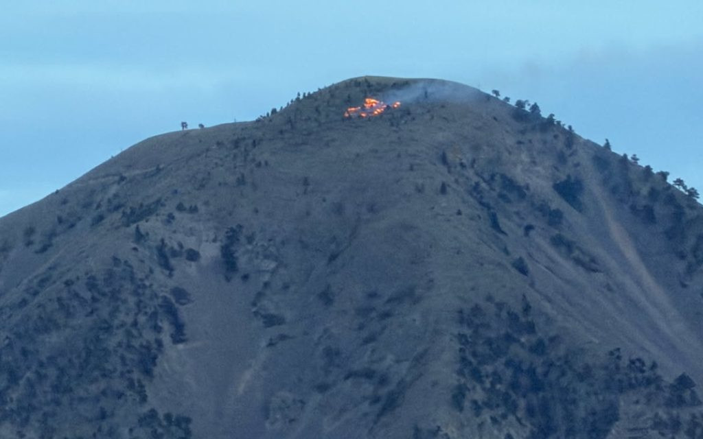 Wildfire reported at top of Bear Butte Friday night
