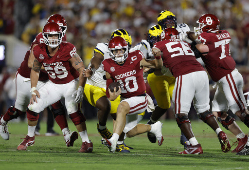 John Mateer has 2 TDs rushing, 1 passing as No. 18 Oklahoma beats No. 15 Michigan 24-13