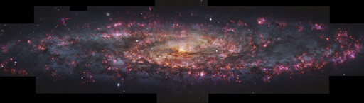 This photo of the nearby Sculptor galaxy spans 65,000 light years