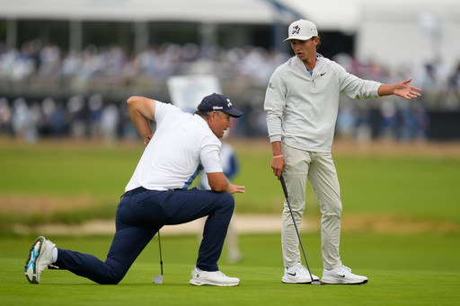Well done, young man: 17-year-old Russell’s US Open debut impresses 54-year-old partner Harrington