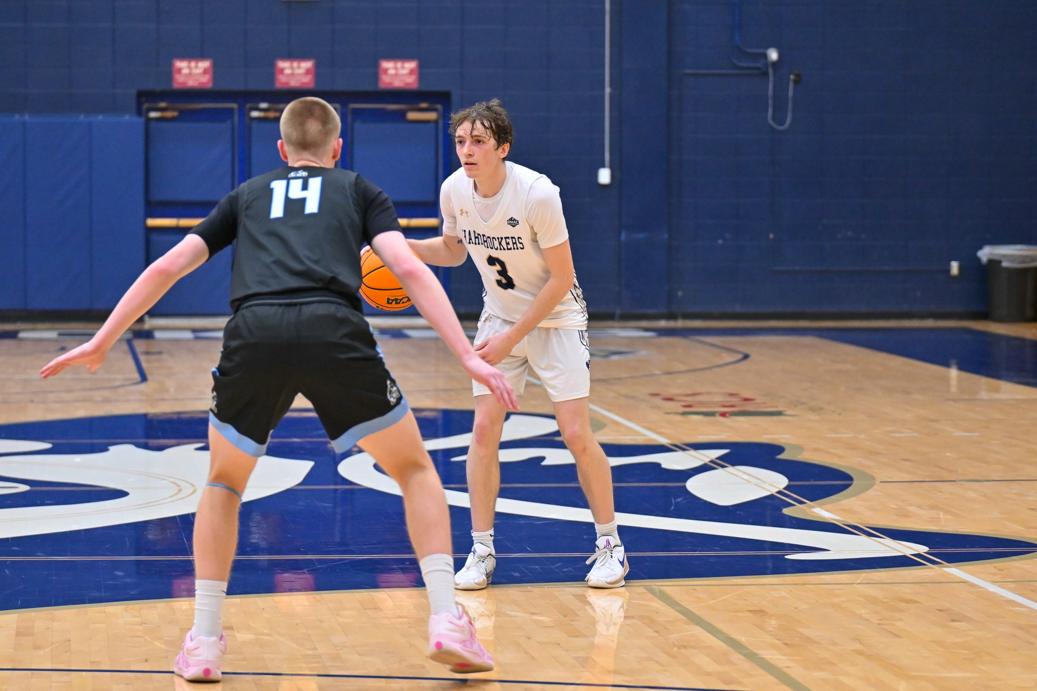 Sweeney Scores 15 in Last Four Minutes, Hardrockers Defeat Cougars 72-66