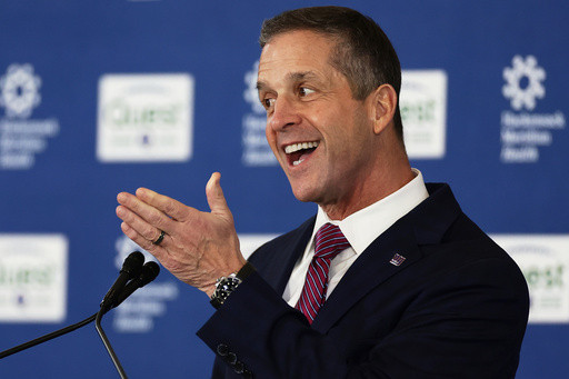 New coach John Harbaugh embraces the challenge of turning the Giants back into contenders