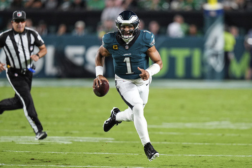Defending champion Eagles edge Cowboys 24-20 in wild, lightning-delayed NFL season opener
