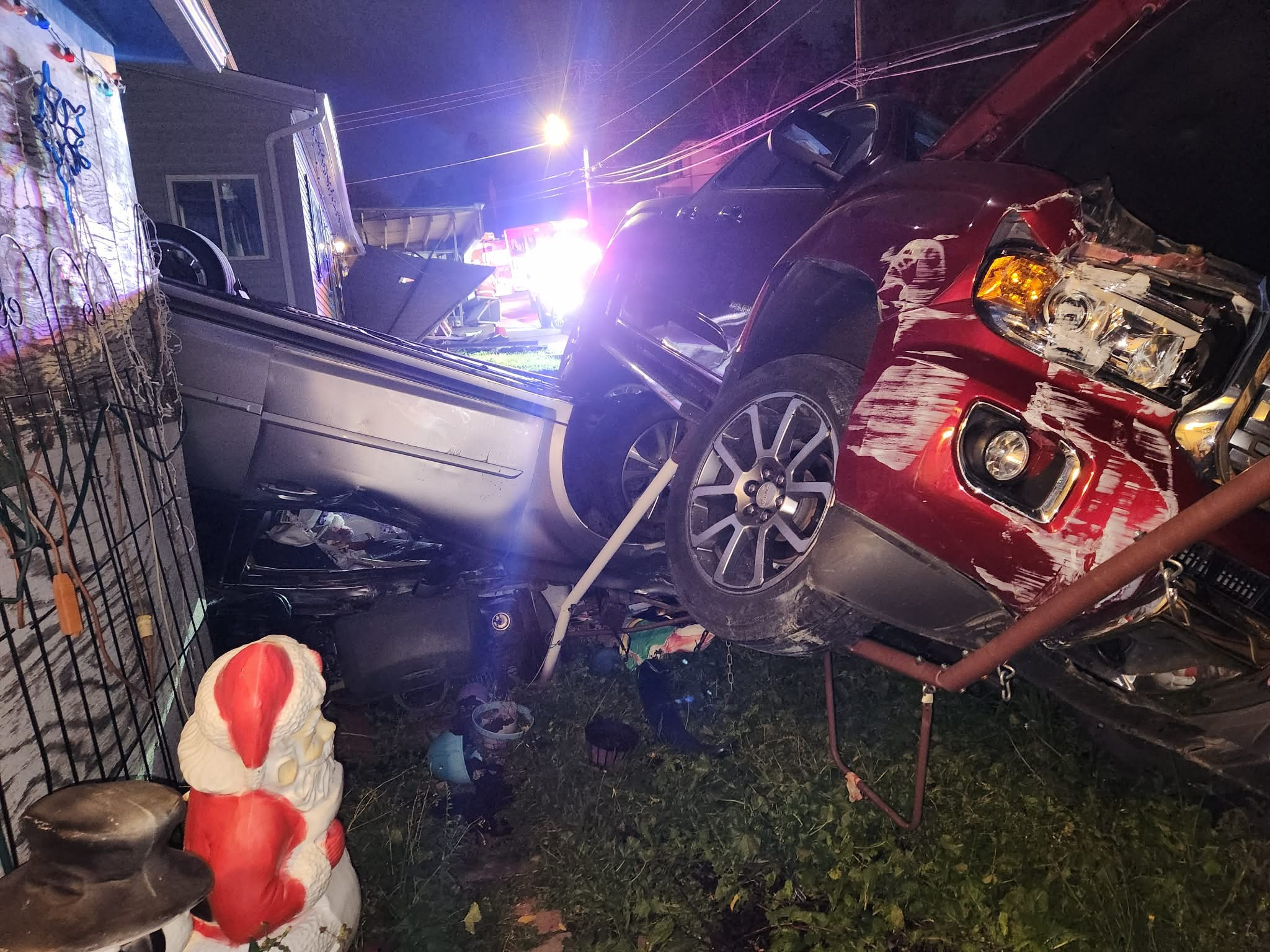 No injuries reported after motor vehicle strikes garage in Lead