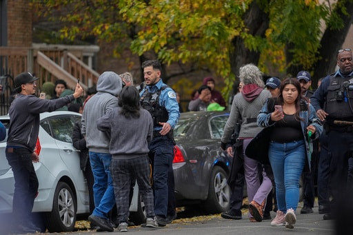 Suburban Chicago dad and toddler headed to store says they were pepper-sprayed by federal agents