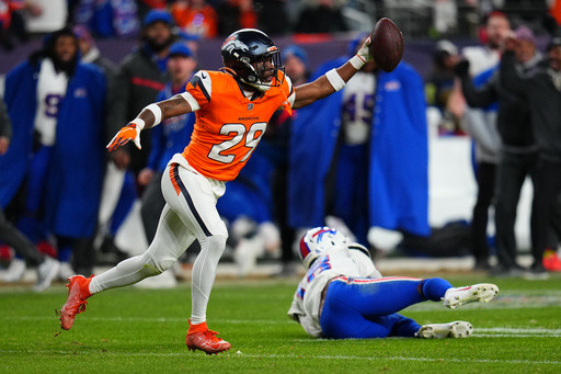 Broncos advance to AFC title game, beating Bills 33-30 after McMillian’s INT in overtime