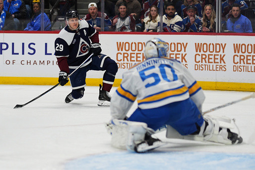 MacKinnon scores 400th goal and Nichushkin nets hat trick as Avalanche rout Blues 6-1