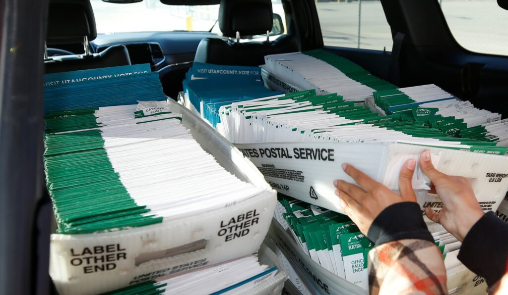 Why the rushed Postal Service plan for mail-in voting has states in a panic