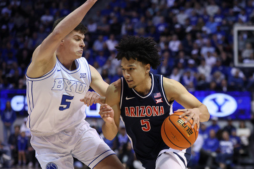 Top-ranked Arizona withstands late rally by No. 13 BYU to remain unbeaten with 86-83 win