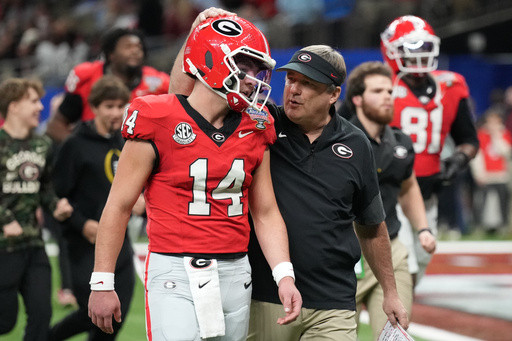 Georgia’s Smart gambles on fourth down with mixed results in a CFP loss to Ole Miss